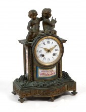 A FRENCH PORCELAIN MOUNTED GIL