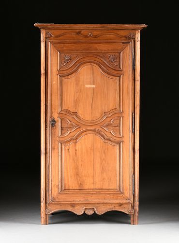 A FRENCH PROVINCIAL CARVED CHERRY