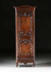 A FRENCH PROVINCIAL CARVED OAK