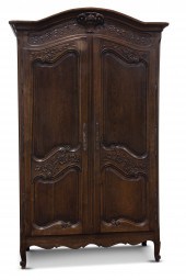 A FRENCH PROVINCIAL OAK ARMOIR