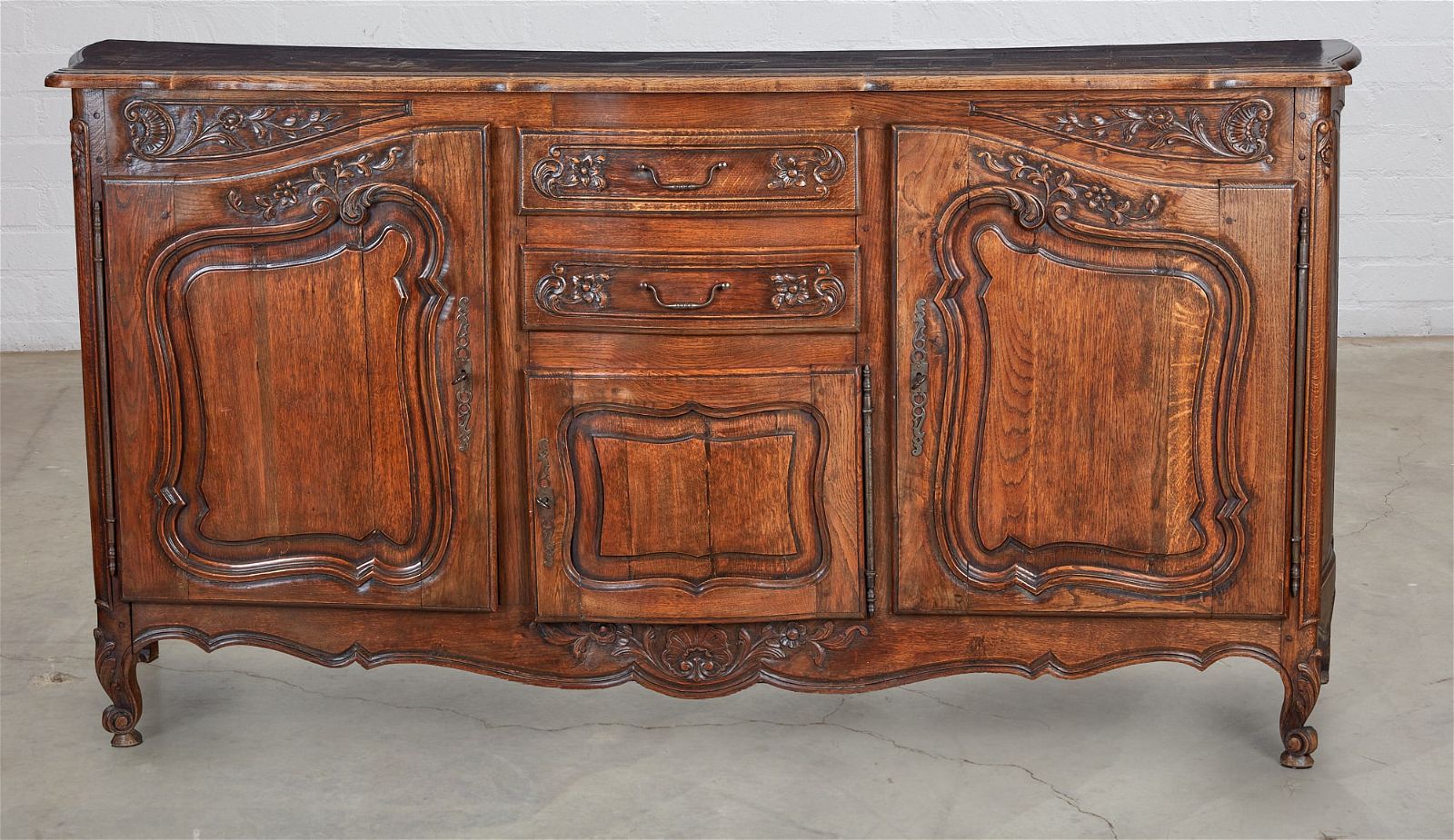 A FRENCH PROVINCIAL OAK BUFFET,