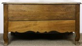 A FRENCH PROVINCIAL OAK COFFER