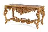 A FRENCH REGENCE-STYLE GILTWOO