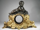 A French Rococo style bronze a