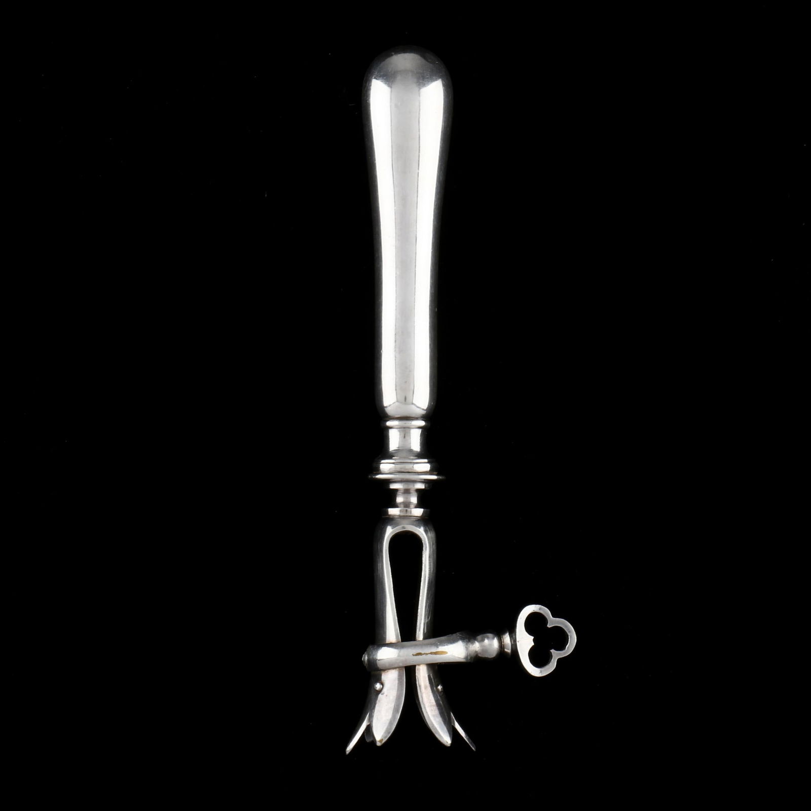 A FRENCH SILVER-PLATED BONE HOLDERA