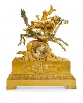 A FRENCH SILVERED AND GILT-BRO