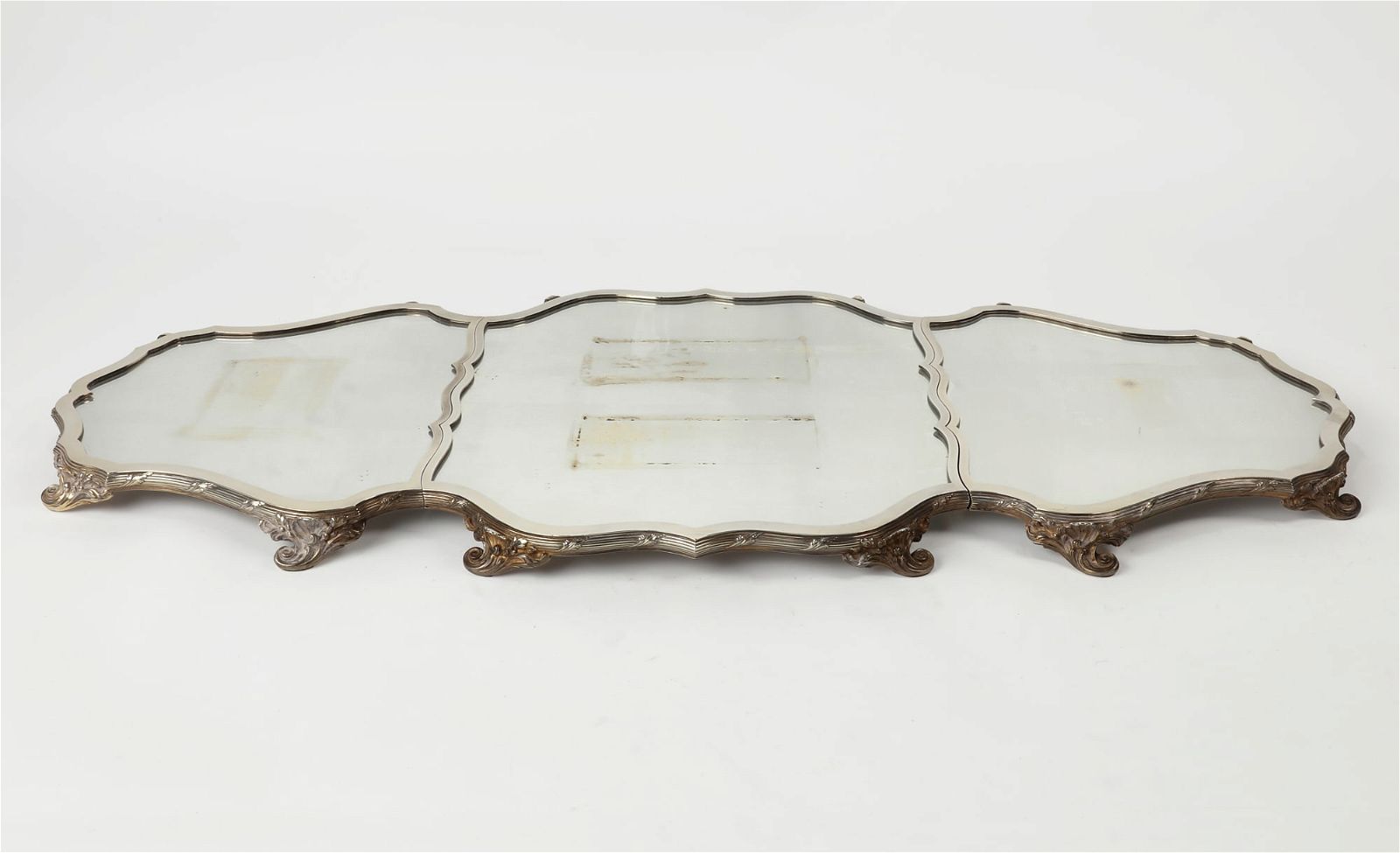 A FRENCH SILVERED BRONZE SURTOUT DE