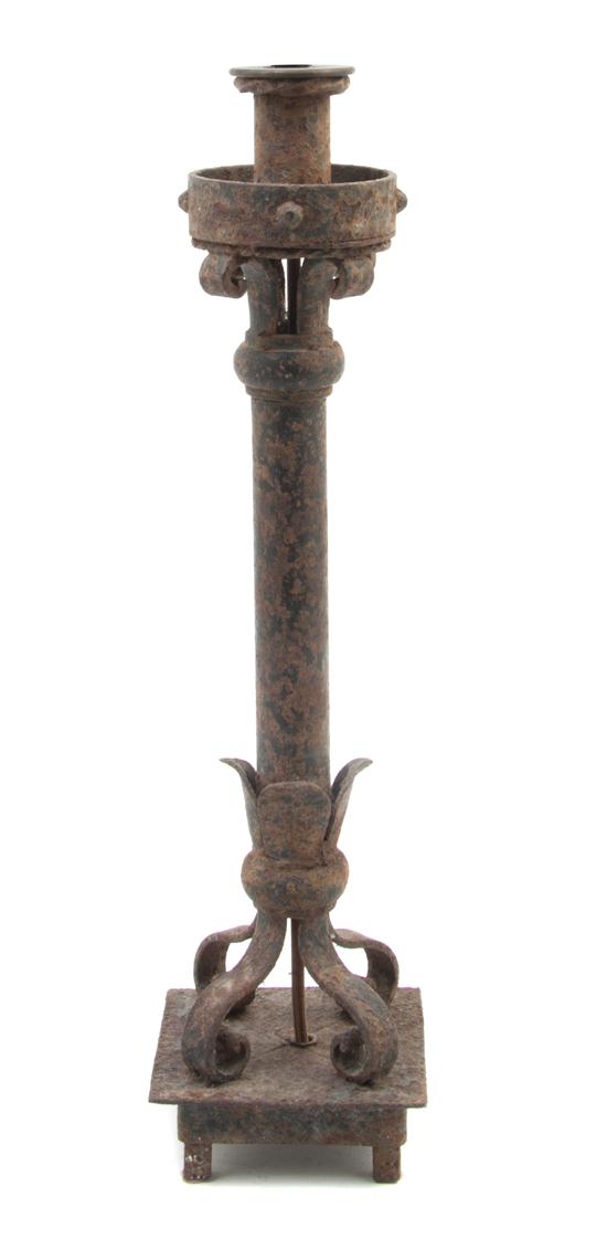 A French Wrought Iron Lamp having a