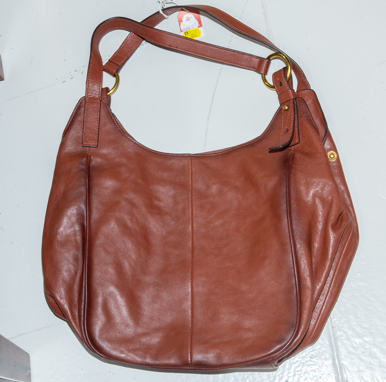 A FRYE SHOULDER BAG A brown leather