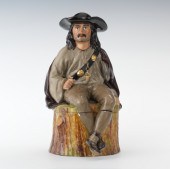 A Full Figural Seated Explorer