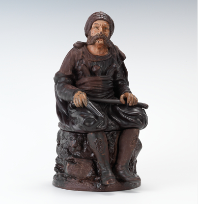 A Full Figural Tobacco Jar of