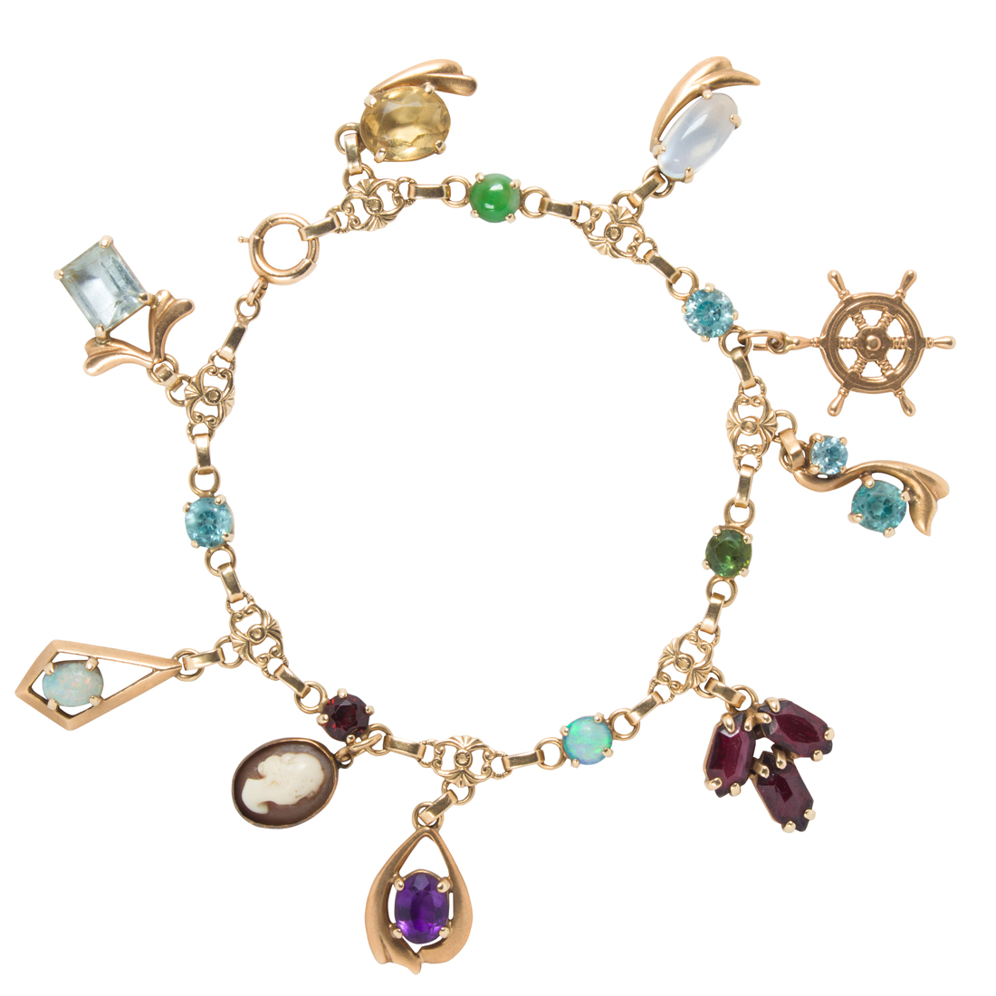 A GEM-SET AND 14K GOLD CHARM