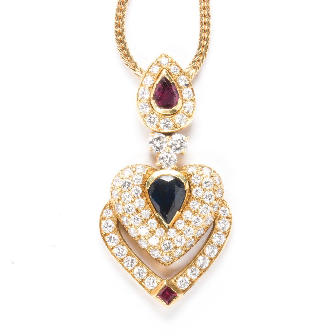 A GEMSTONE AND EIGHTEEN KARAT