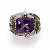 A GEMSTONE AND EIGHTEEN KARAT
