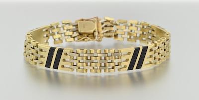 A Gentleman's 14k Gold Bracelet 14k