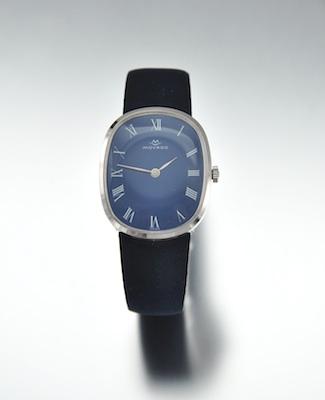 A Gentleman's 14k Gold Movado Watch