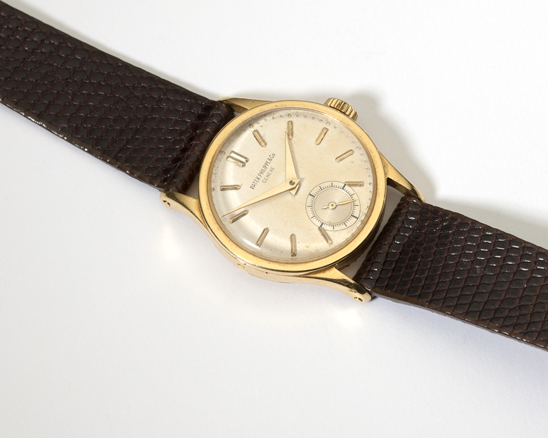 A gentleman's 18K gold wristwatch