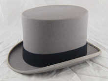 A gentleman's grey top hat size 6