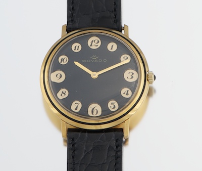 A Gentleman's Movado 18k Gold Watch