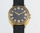 A Gentleman's Movado 18k Gold