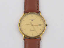 A gent's gold plated quartz wrist