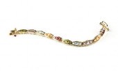 A GEOMETRIC 14K YELLOW GOLD MU
