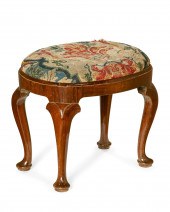 A GEORGE I WALNUT OVAL STOOLA