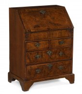 A GEORGE I WALNUT SLANT FRONT