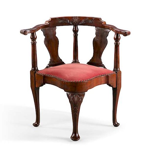 A GEORGE II CARVED MAHOGANY