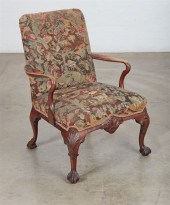 A GEORGE II CARVED WALNUT OPEN