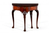 A GEORGE II CARVED WALNUT FOLD