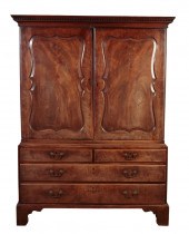 A GEORGE II MAHOGANY LINEN PRE