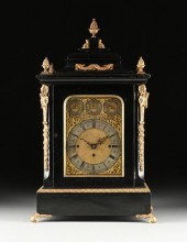 A GEORGE II STYLE GILT BRASS M