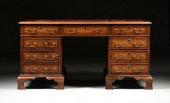 A GEORGE II STYLE WALNUT BURGU