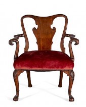 A GEORGE II WALNUT ARMCHAIR, I