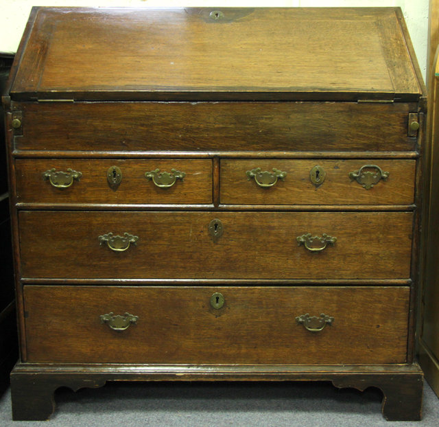 A George III and later oak bureau