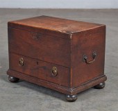 A GEORGE III BRASS MOUNTED OAK