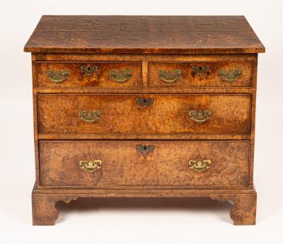 A George III burr elm chest of