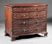 A George III Carved Mahogany C