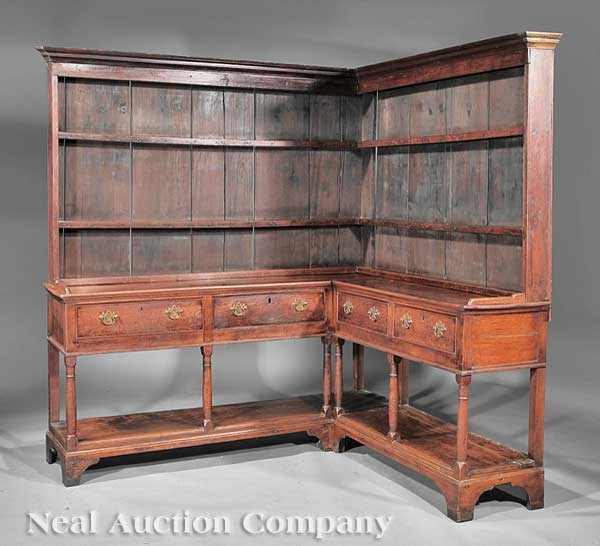 A George III Carved Oak "Corner