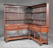 A George III Carved Oak "Corne