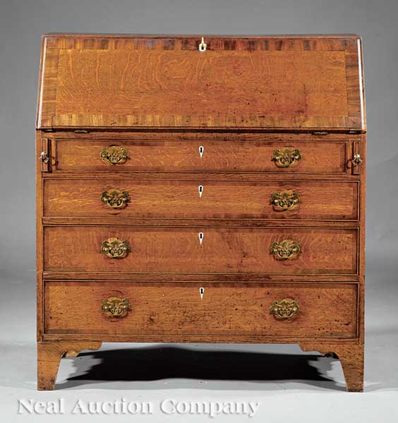 A George III Carved Oak Slant-Front