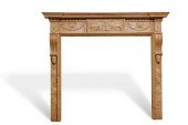 A GEORGE III CARVED PINE FIRE