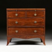 A GEORGE III MAHOGANY BACHELOR