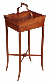 A GEORGE III MAHOGANY “BASKET”