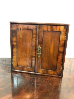 A George III mahogany cabinet
