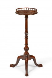A GEORGE III MAHOGANY CANDLEST