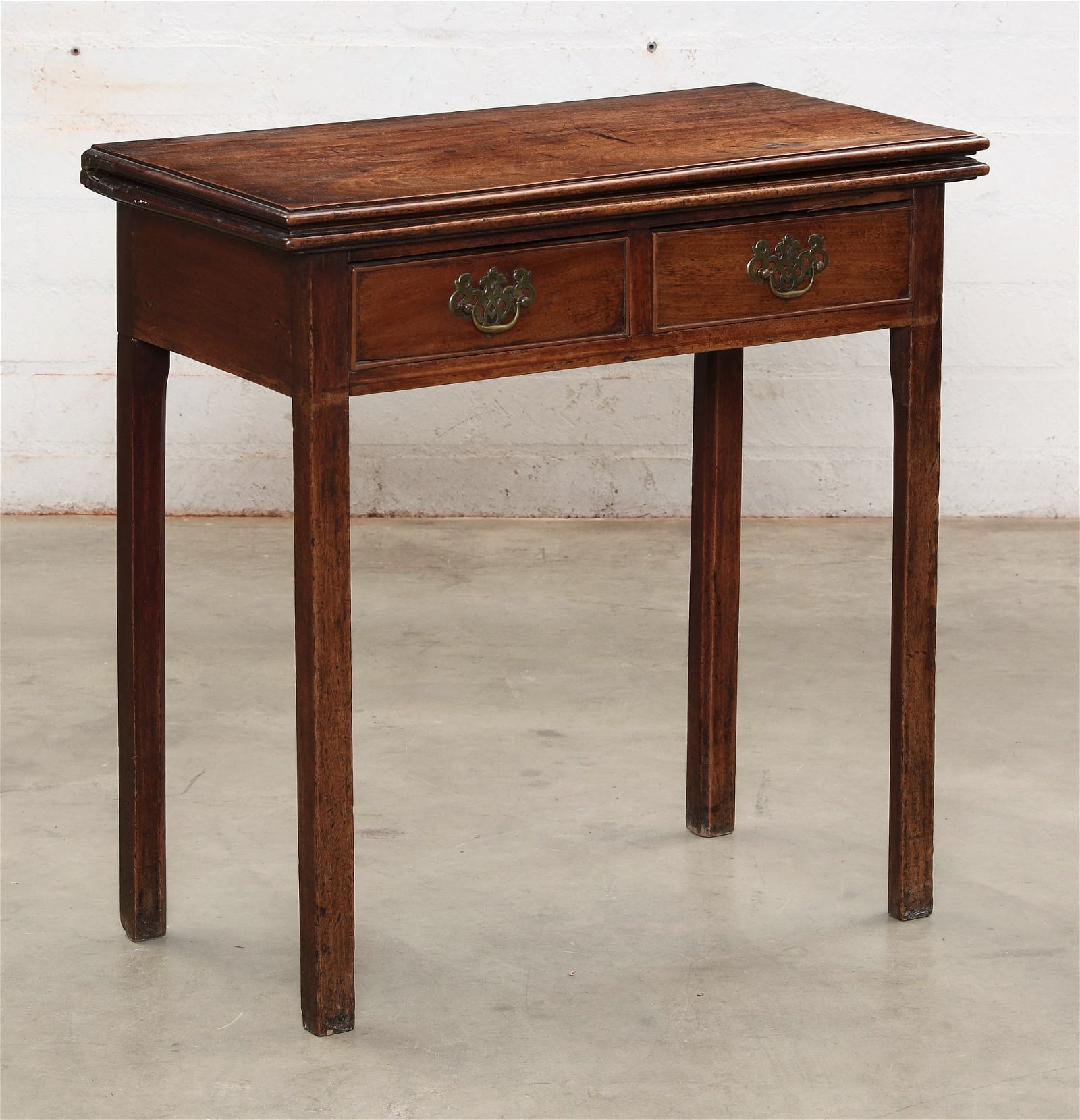 A GEORGE III MAHOGANY CARD TABLEA