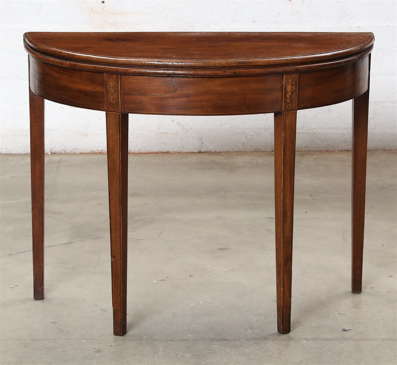 A GEORGE III MAHOGANY CARD TABLEA