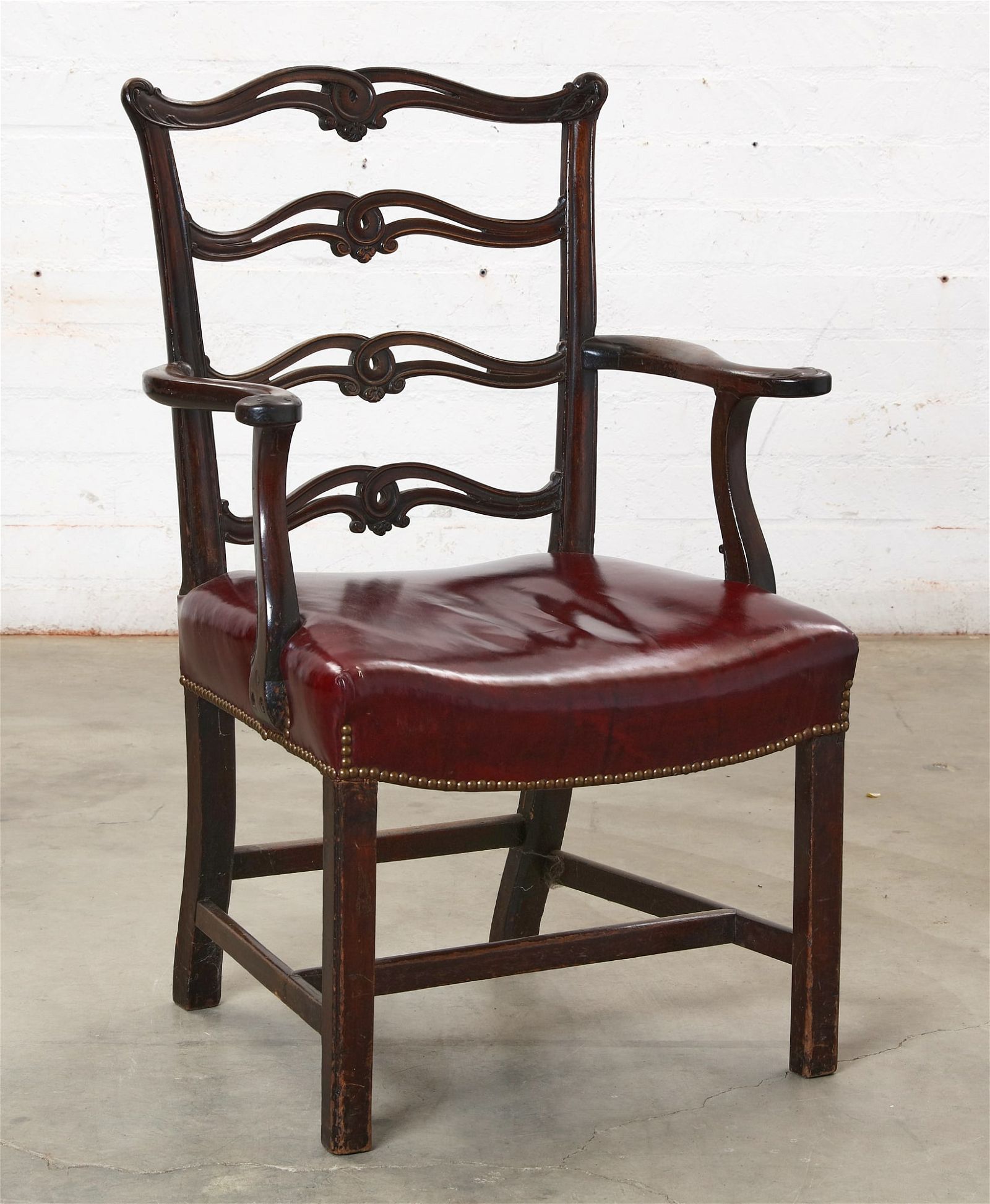 A GEORGE III MAHOGANY LADDER BACK